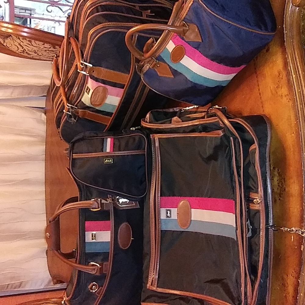 LARKS  VINTAGE LUGGAGE SOLD SEPARATELY